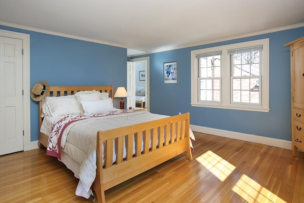 24 Estabrook Road Newton, MA 02465 - Photo 14 of 15 a bedroom with a bed and a window