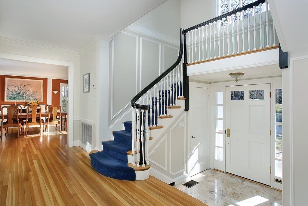 24 Estabrook Road Newton, MA 02465 - Photo 8 of 15 a view of entryway and hall with wooden floor