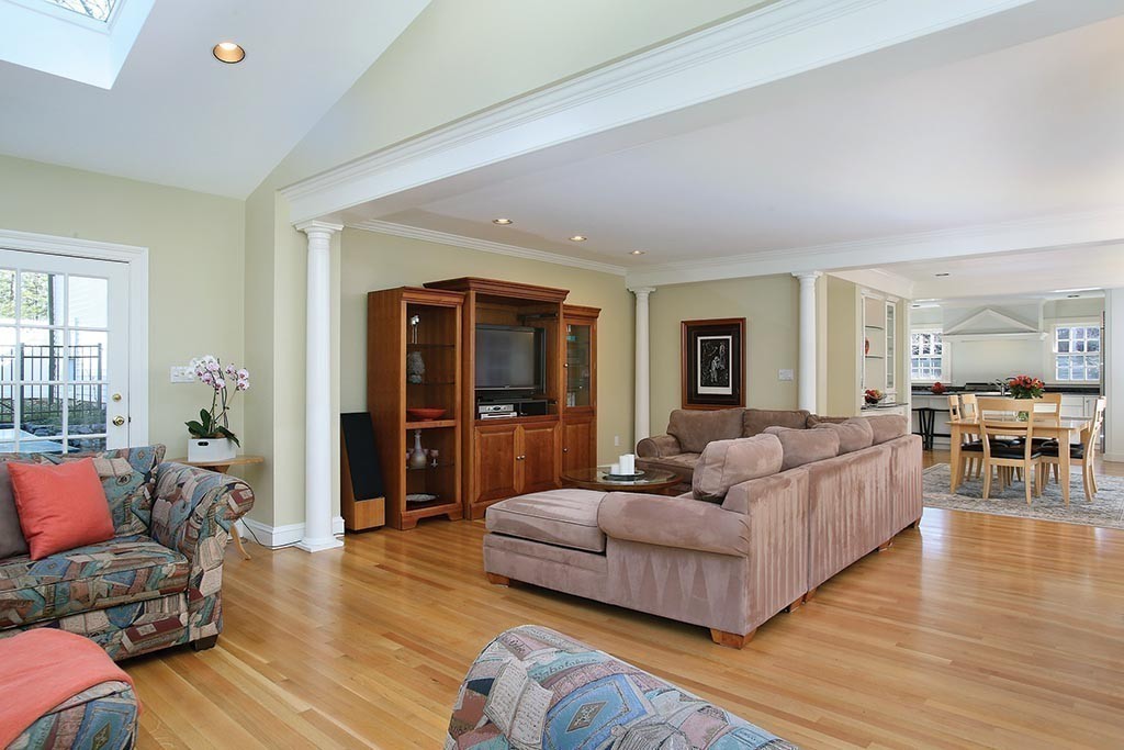 24 Estabrook Road Newton, MA 02465 - Photo 10 of 15 a living room with furniture and a wooden floor