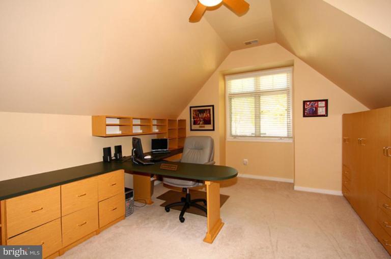 1441 Waterfront Road Reston, VA 20194 - Photo 20 of 30 a workspace with chandelier