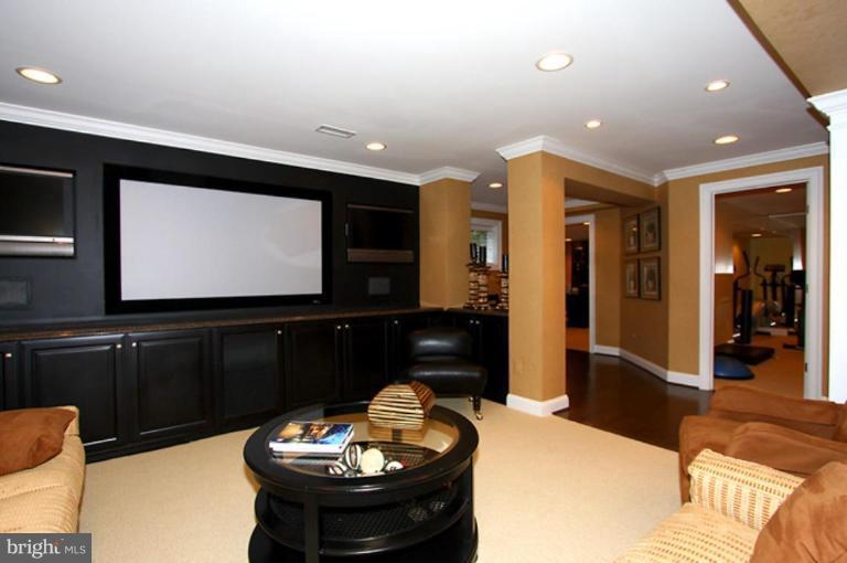 1441 Waterfront Road Reston, VA 20194 - Photo 26 of 30 a living room with furniture and a flat screen tv