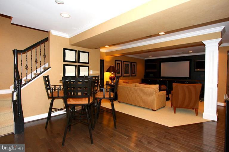 1441 Waterfront Road Reston, VA 20194 - Photo 27 of 30 a living room with furniture and a flat screen tv
