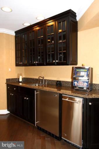 1441 Waterfront Road Reston, VA 20194 - Photo 28 of 30 a kitchen with a sink and cabinets