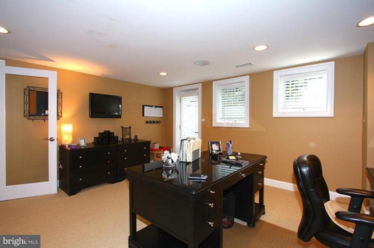 1441 Waterfront Road Reston, VA 20194 - Photo 29 of 30 a living room with furniture window and a flat screen tv