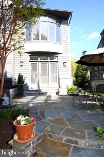 1441 Waterfront Road Reston, VA 20194 - Photo 5 of 30 a front view of a house with a yard