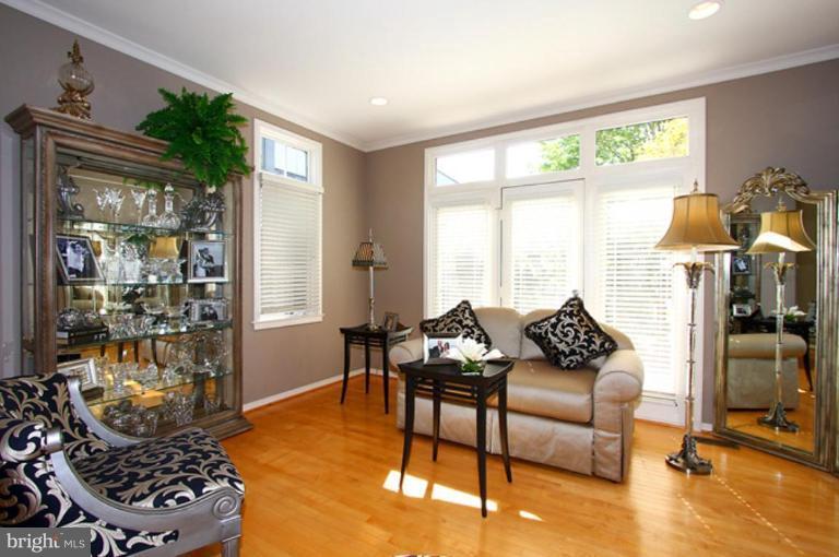 1441 Waterfront Road Reston, VA 20194 - Photo 9 of 30 a living room with furniture and a large window