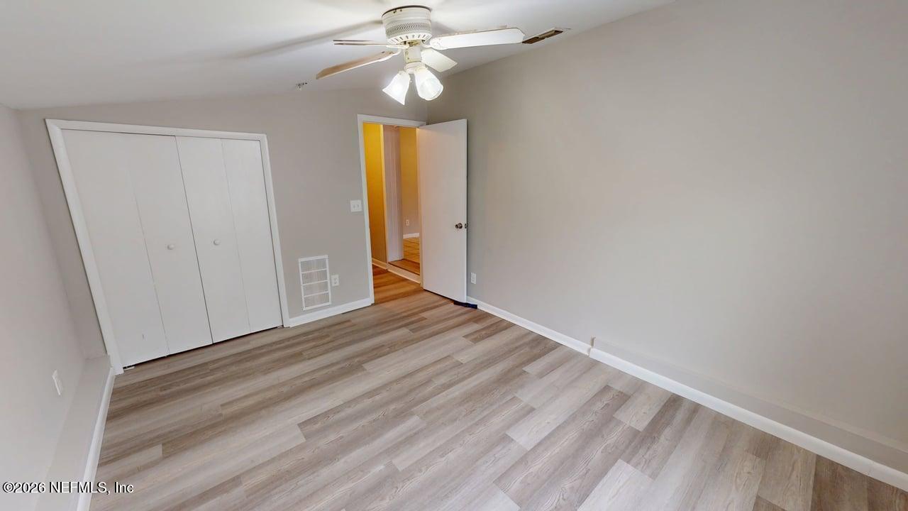 6713 Peter Rabbit Drive North Jacksonville, FL 32210 - Photo 8 of 24 a view of an empty room with a window