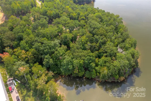 a view of a lake with green space