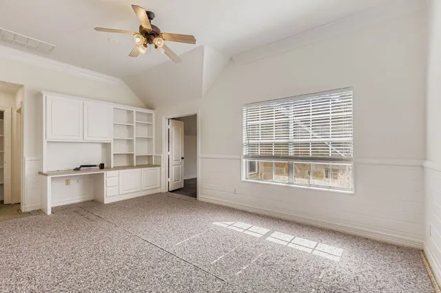 a kitchen with a cabinets and appliances