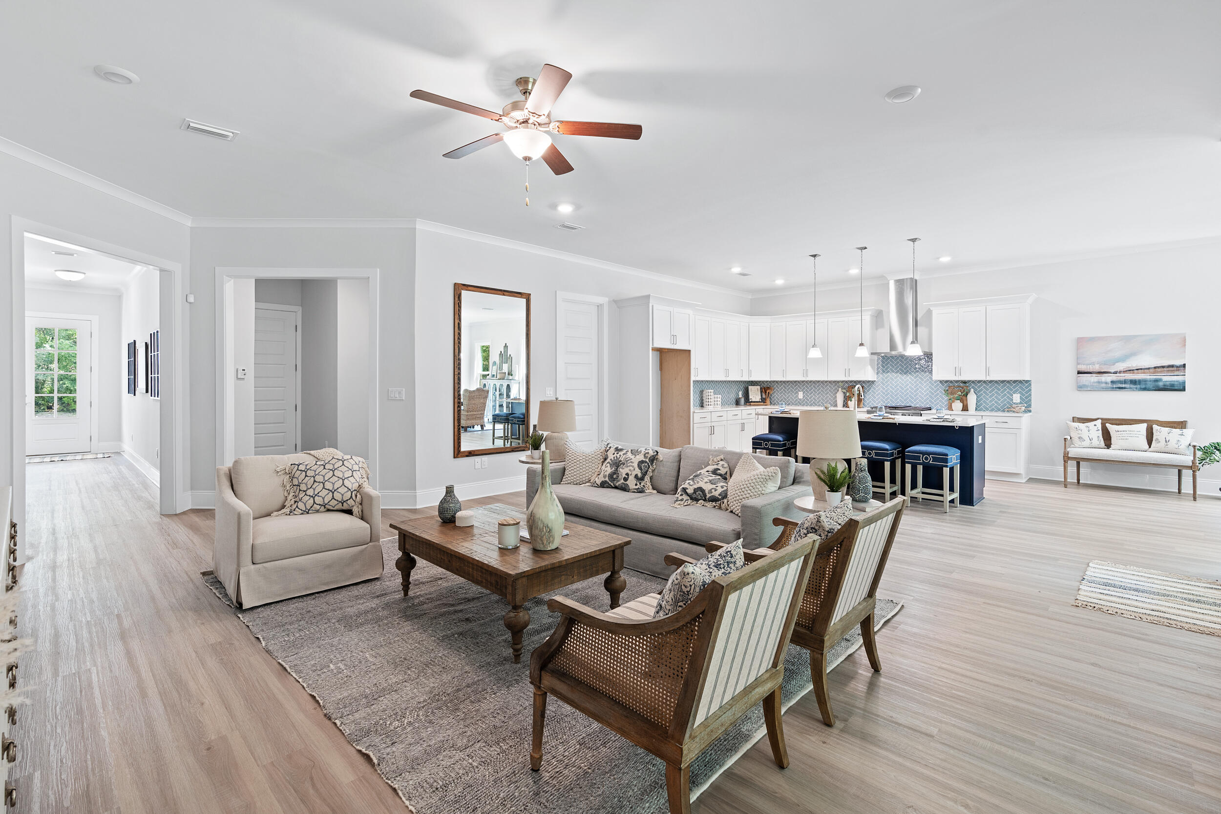 20 Mackenzie Lane, Unit LOT 34 Freeport, FL 32439 - Photo 11 of 50 a living room with furniture and kitchen view