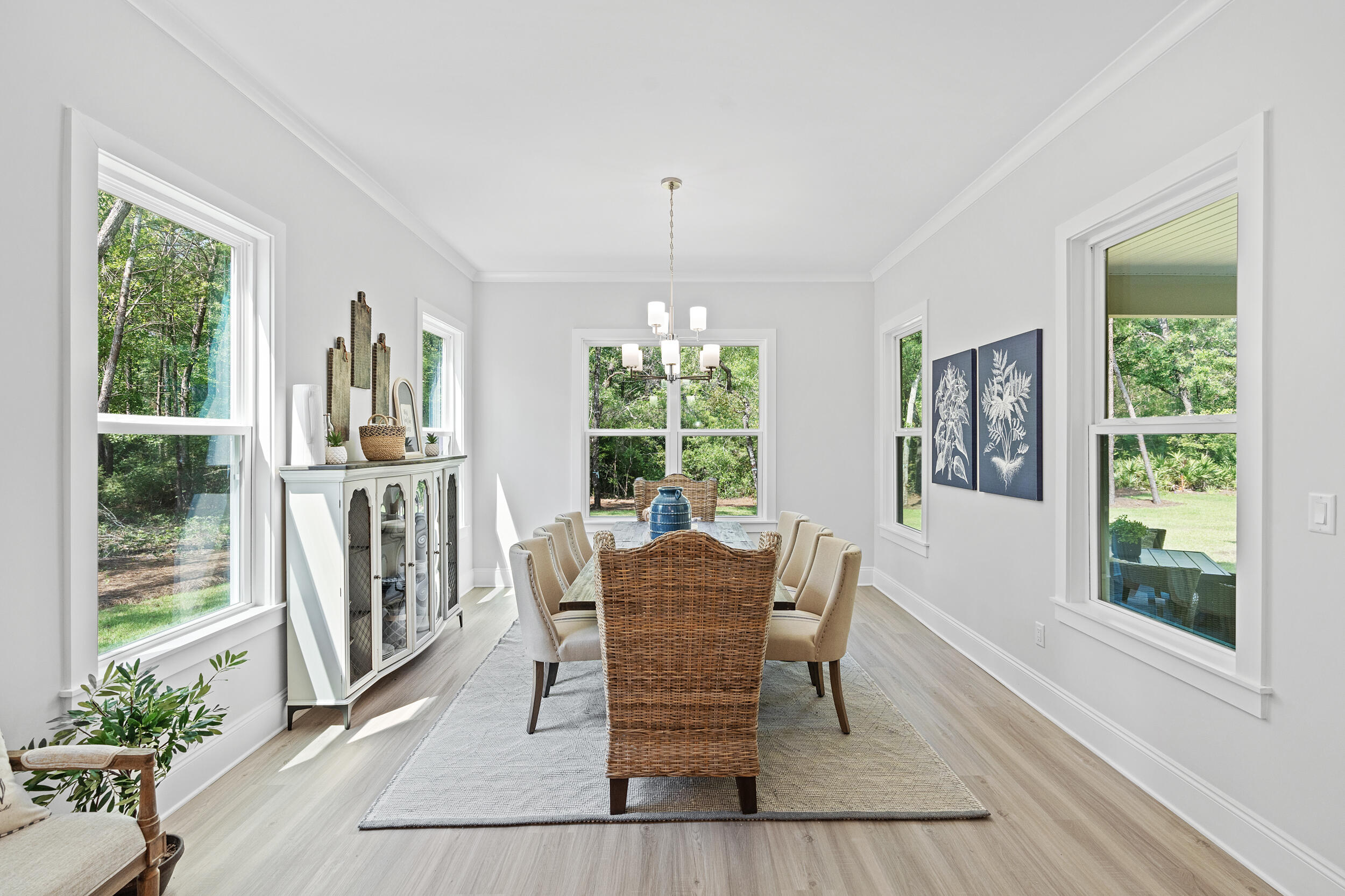 20 Mackenzie Lane, Unit LOT 34 Freeport, FL 32439 - Photo 15 of 50 a view of a dining room with furniture window and outside view