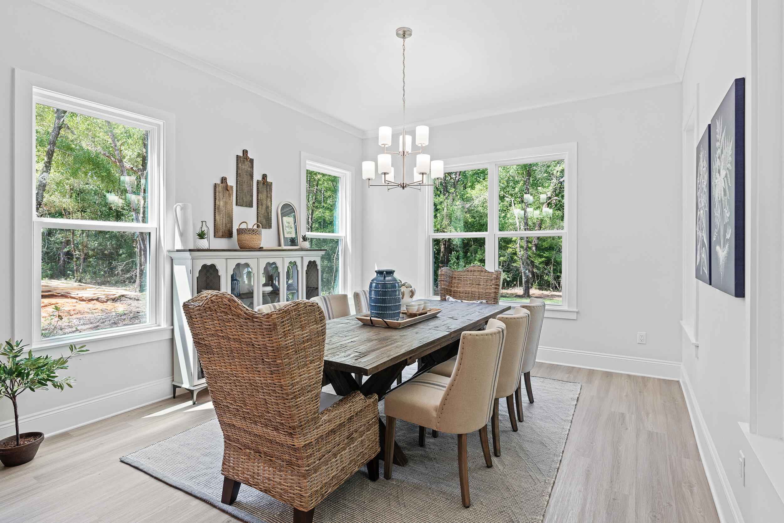 20 Mackenzie Lane, Unit LOT 34 Freeport, FL 32439 - Photo 17 of 50 a view of a dining room with furniture window and outside view