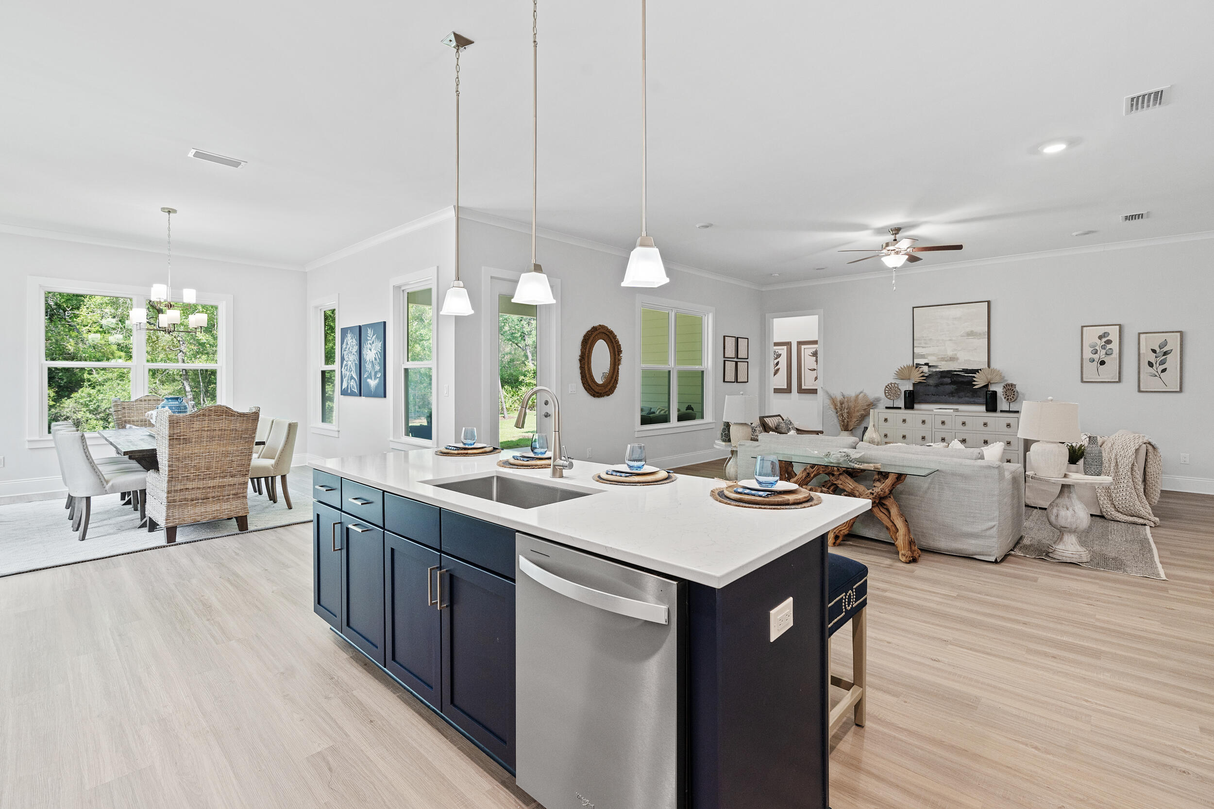 20 Mackenzie Lane, Unit LOT 34 Freeport, FL 32439 - Photo 21 of 50 a large kitchen with a table and chairs