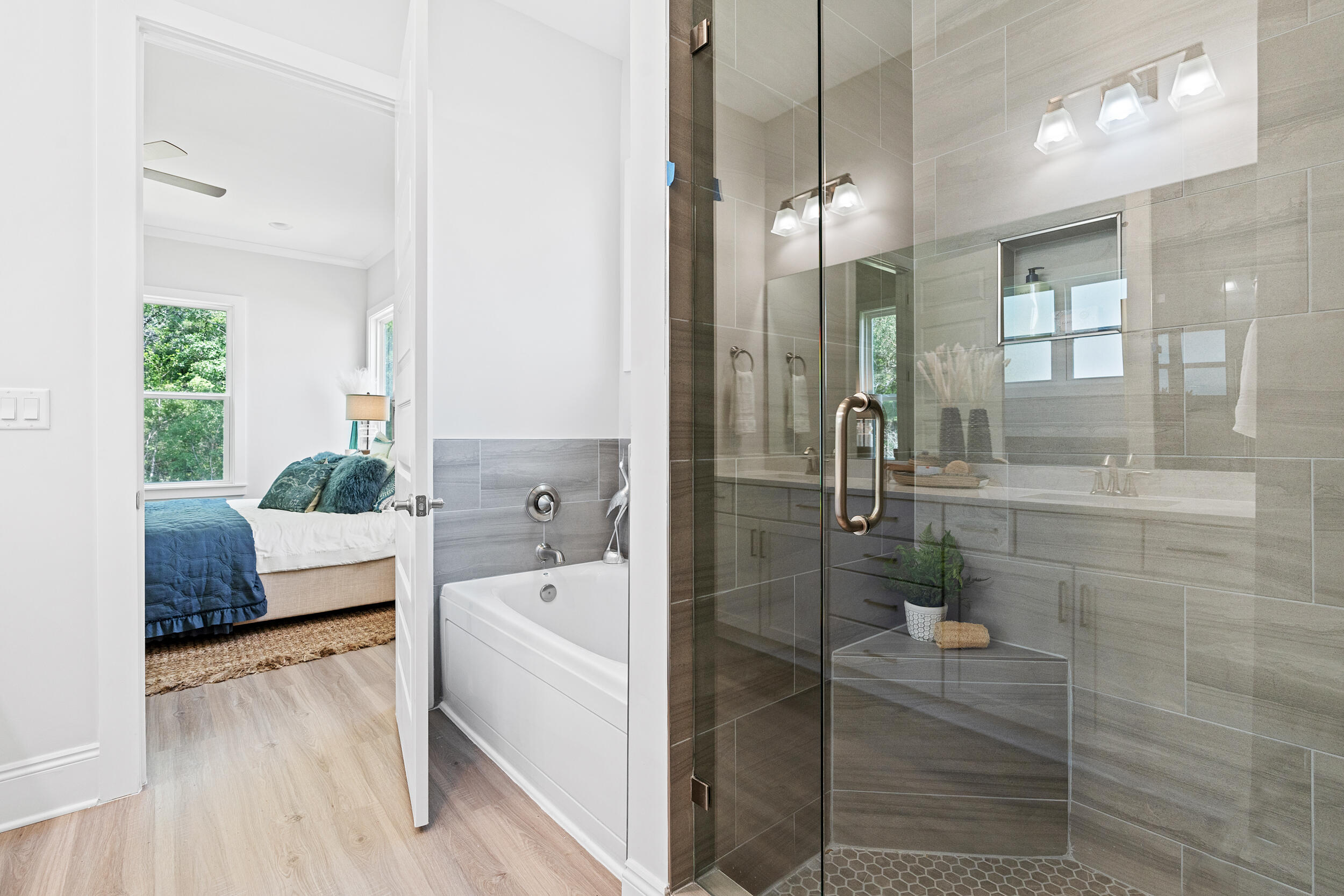 20 Mackenzie Lane, Unit LOT 34 Freeport, FL 32439 - Photo 36 of 50 a bathroom with a tub shower and sink