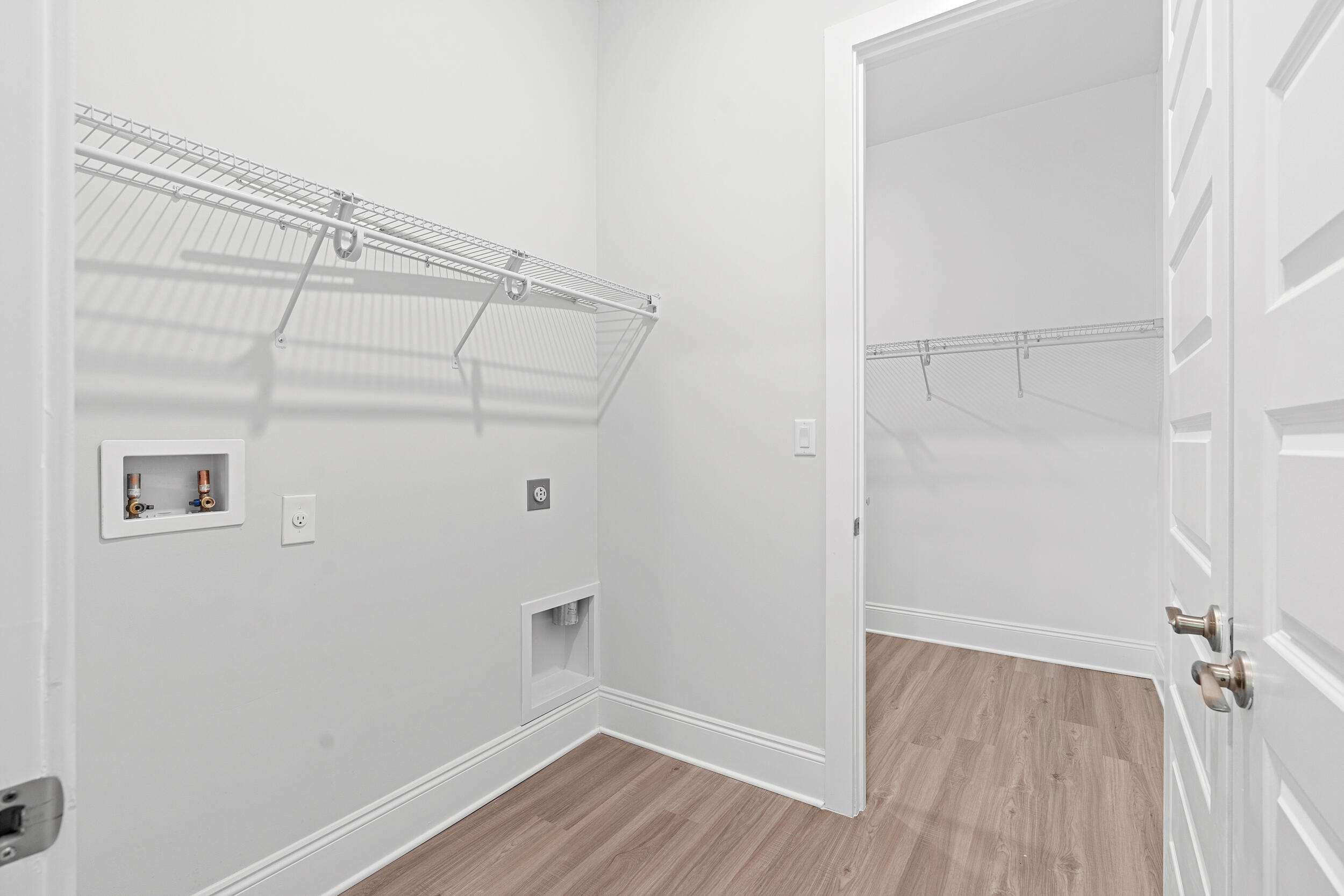 20 Mackenzie Lane, Unit LOT 34 Freeport, FL 32439 - Photo 38 of 50 a view of a room with wooden floor