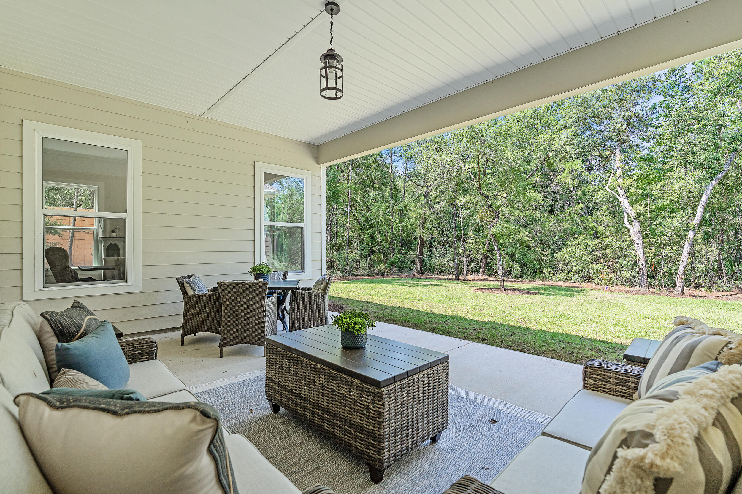 20 Mackenzie Lane, Unit LOT 34 Freeport, FL 32439 - Photo 39 of 50 a living room with furniture and a large window