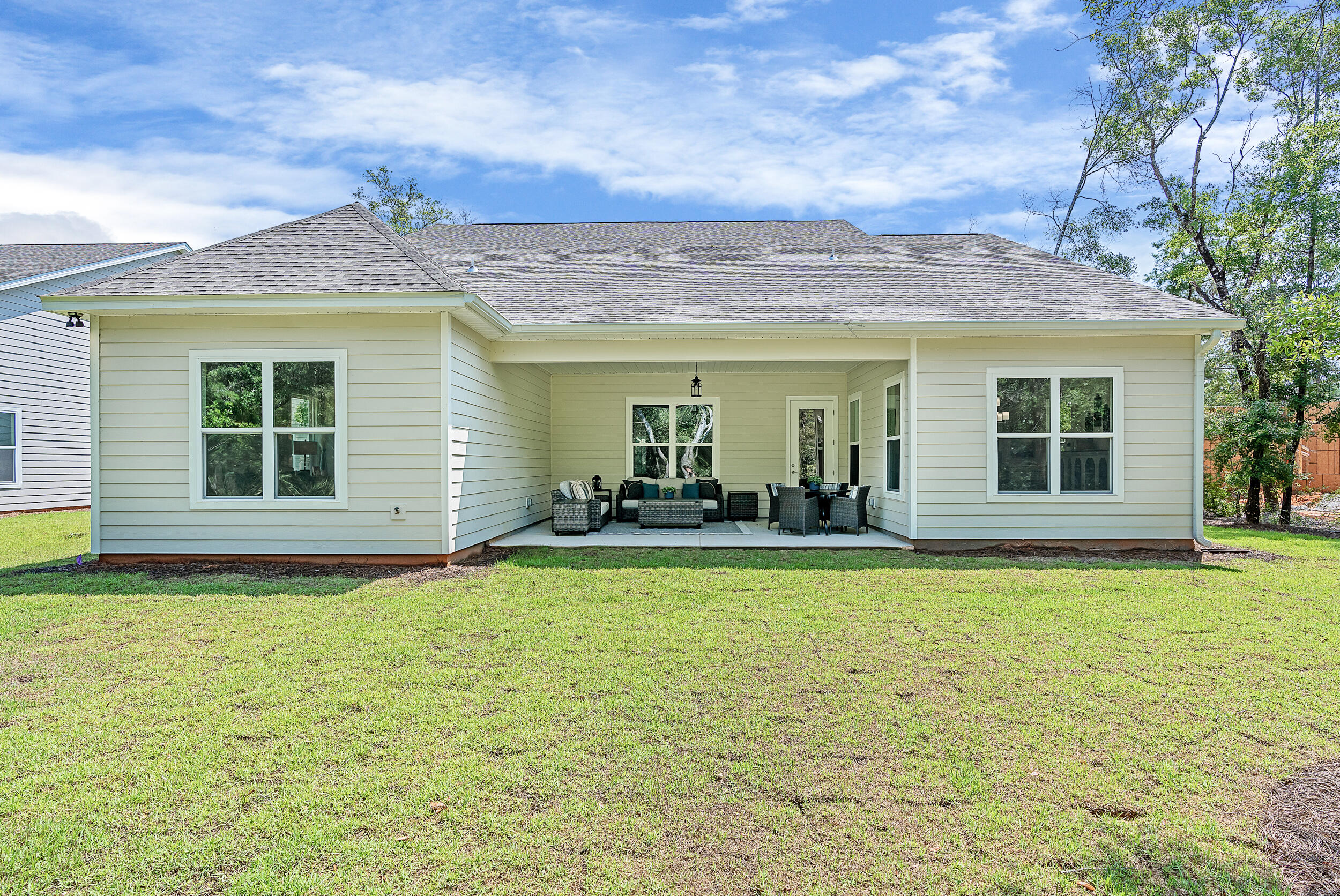 20 Mackenzie Lane, Unit LOT 34 Freeport, FL 32439 - Photo 42 of 50 a view of a swimming pool with a patio