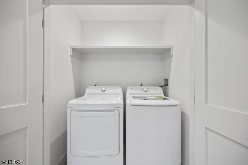 1209 Littleton Road, Unit B Morris Plains, NJ 07950 - Photo 17 of 19 a utility room with dryer and washer