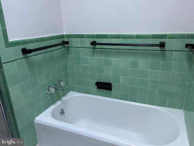 a bathroom with a bathtub