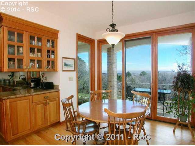 8 West Point Road Colorado Springs, CO 80906 - Photo 5 of 16 Breakfast Nook with Walkout to East Facing Patio and Wonderful City Views