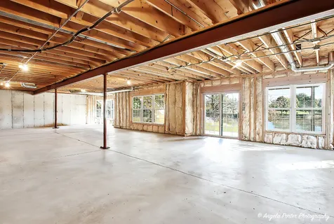a view of an empty room with a sliding door