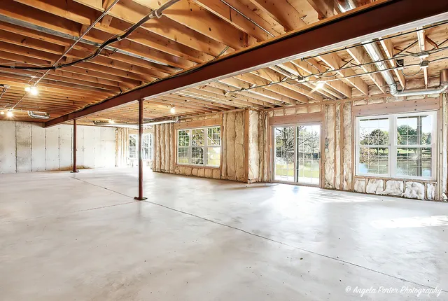 a view of an empty room with a sliding door