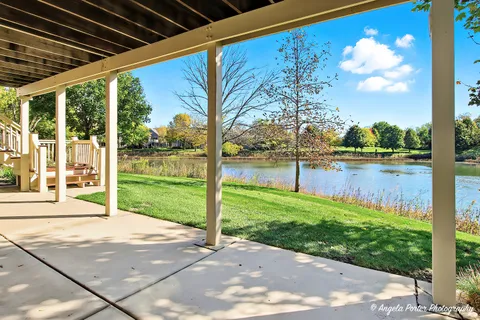 a view of a porch and garden