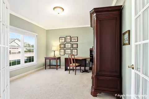 a view of a livingroom with furniture window and outside view