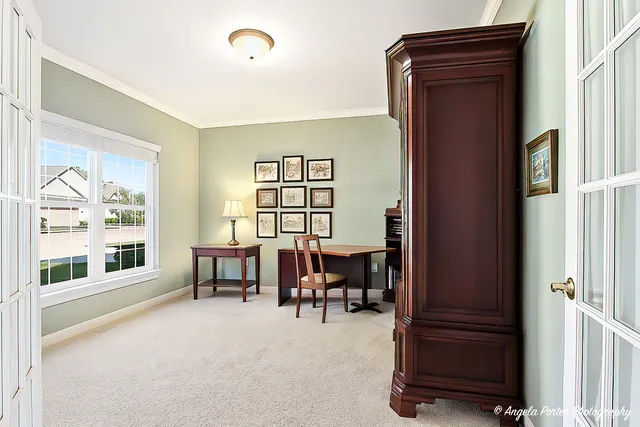 a view of a livingroom with furniture window and outside view