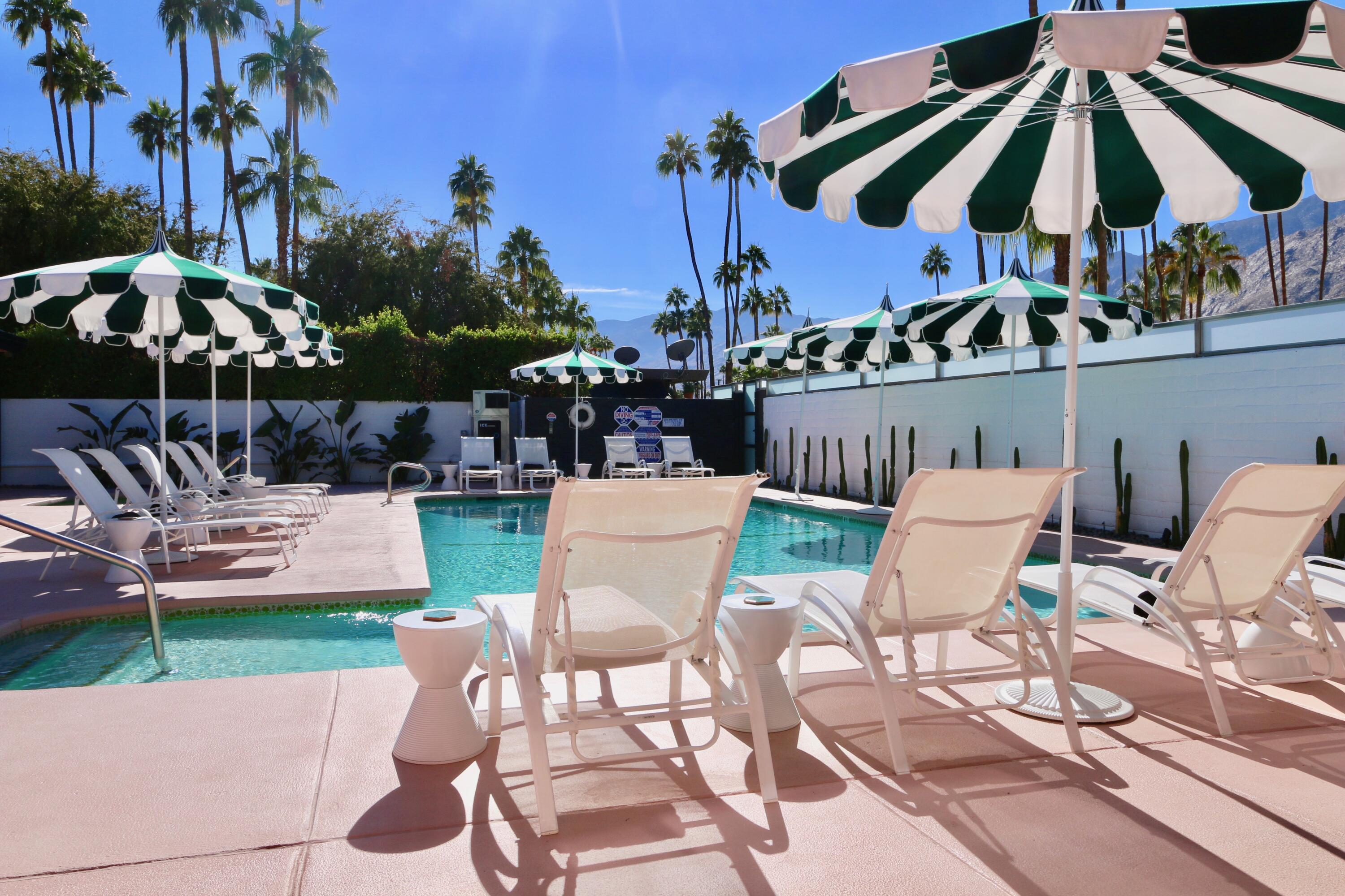 598 South Grenfall Road Palm Springs, CA 92264 - Photo 15 of 35 a view of a chairs and table in backyard