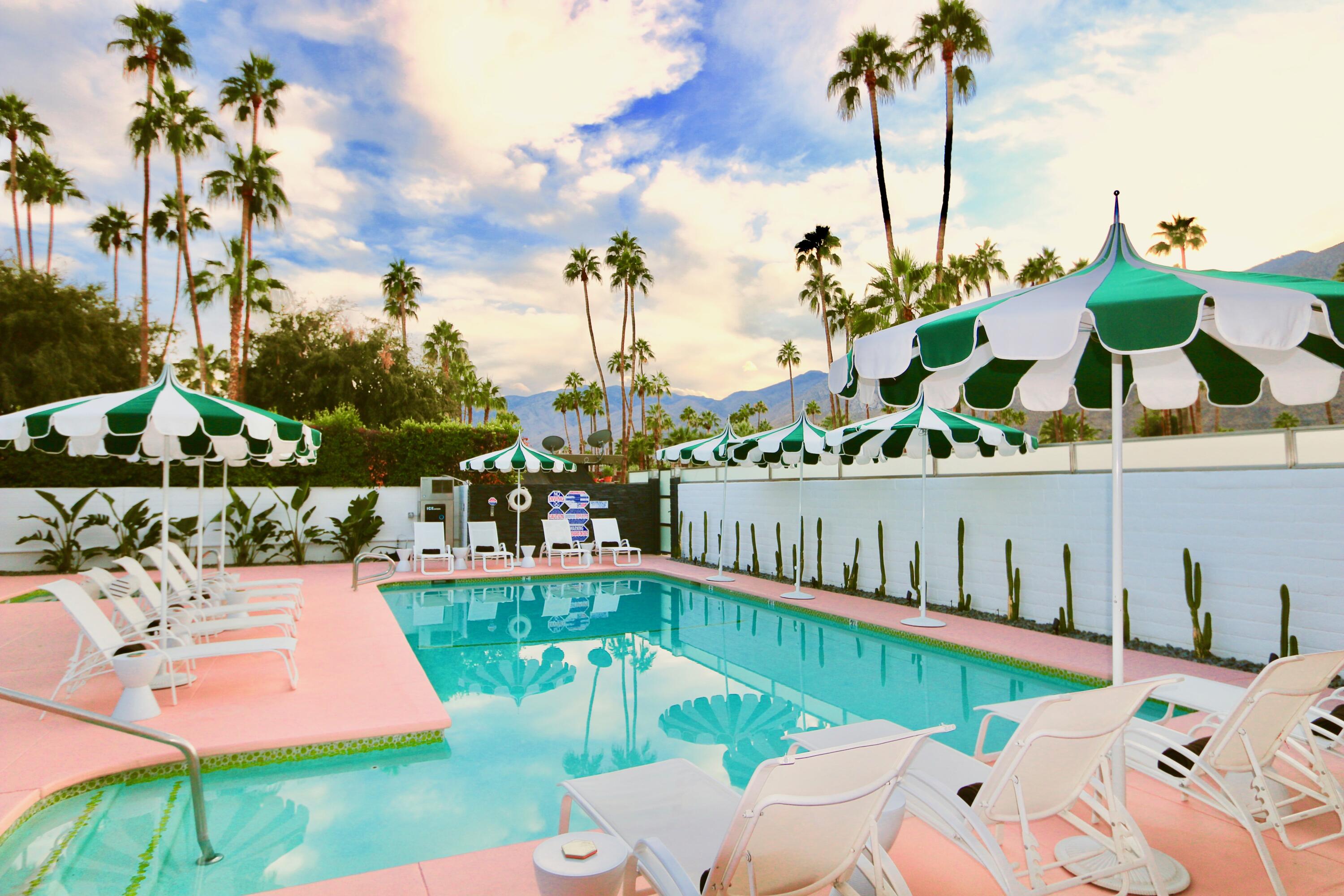 598 South Grenfall Road Palm Springs, CA 92264 - Photo 26 of 35 a view of a swimming pool and lounge chairs