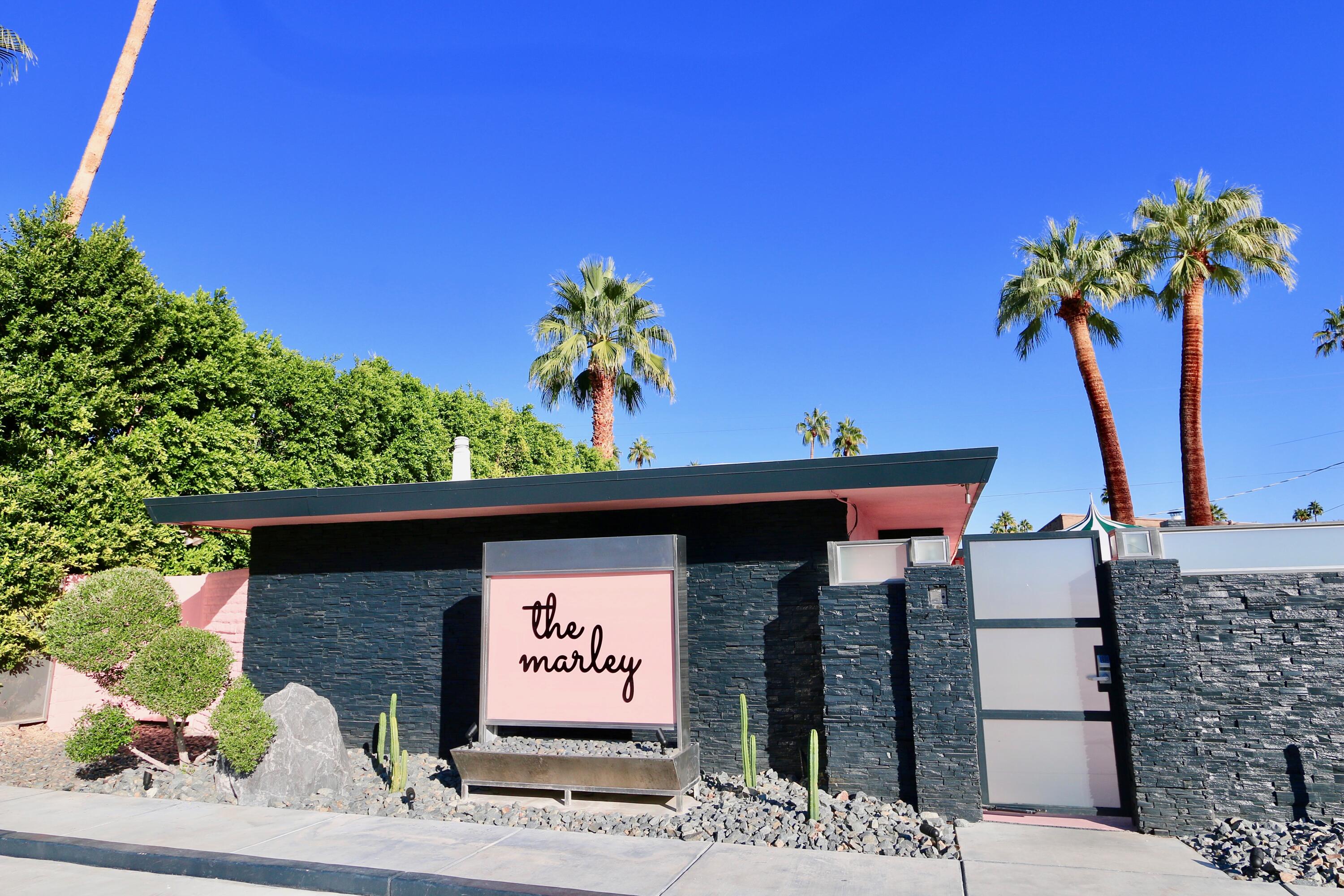 598 South Grenfall Road Palm Springs, CA 92264 - Photo 32 of 35 a sign that is on the wall of a building