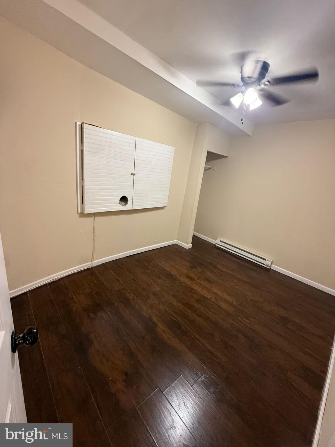 5677 Diamond Street Philadelphia, PA 19131 - Photo 5 of 7 wooden floor in an empty room