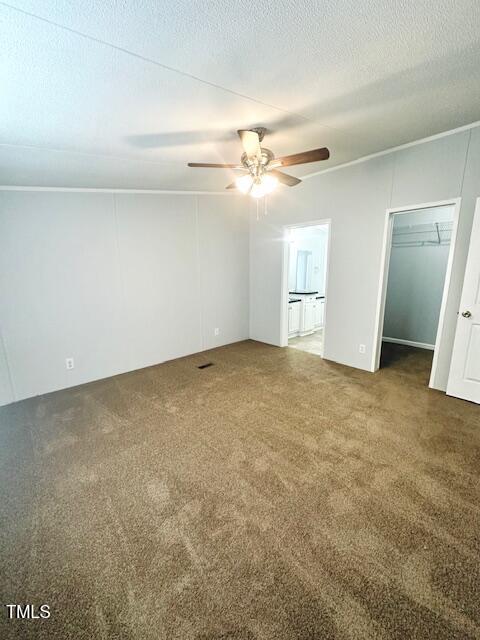 1199 Adams Mountain Road Stem, NC 27581 - Photo 25 of 34 an empty room with windows and fan