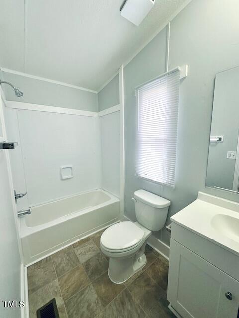 1199 Adams Mountain Road Stem, NC 27581 - Photo 29 of 34 a bathroom with a toilet a sink and a bathtub