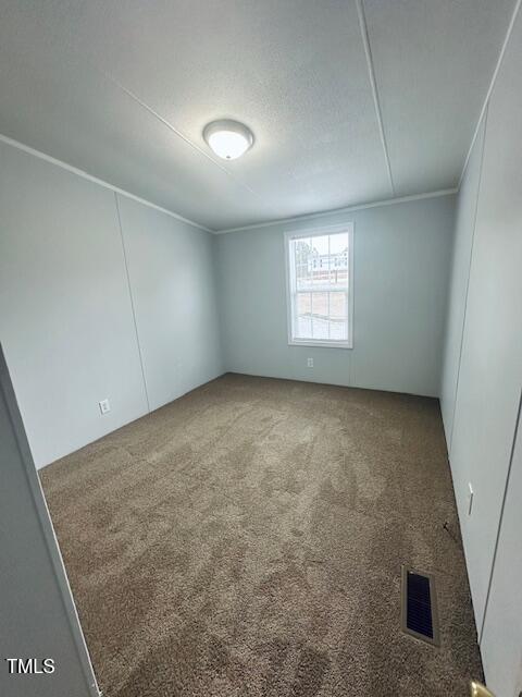 1199 Adams Mountain Road Stem, NC 27581 - Photo 31 of 34 an empty room with a empty space and windows