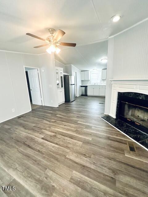 1199 Adams Mountain Road Stem, NC 27581 - Photo 7 of 34 a view of an empty room with a fireplace and a window