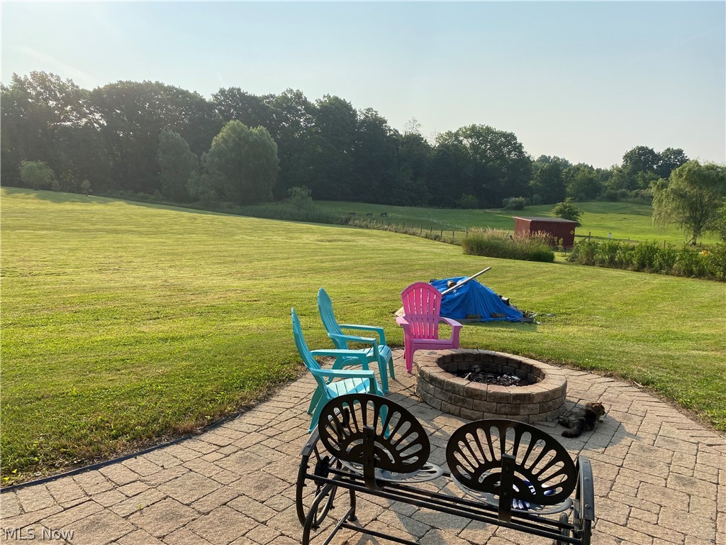 5124 Powder Mill Road Kent, OH 44240 - Photo 25 of 27 Paved Fire pit on lower level just outside of walkout bsmnt