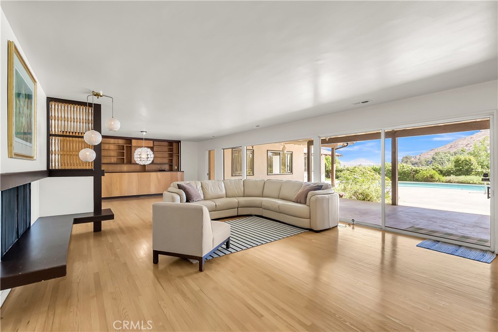 4907 Cliffside Drive Riverside, CA 92506 - Photo 13 of 29 a living room with furniture and a large window