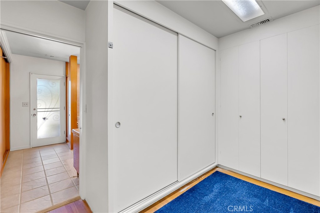 4907 Cliffside Drive Riverside, CA 92506 - Photo 17 of 29 a view of an empty room and wooden floor