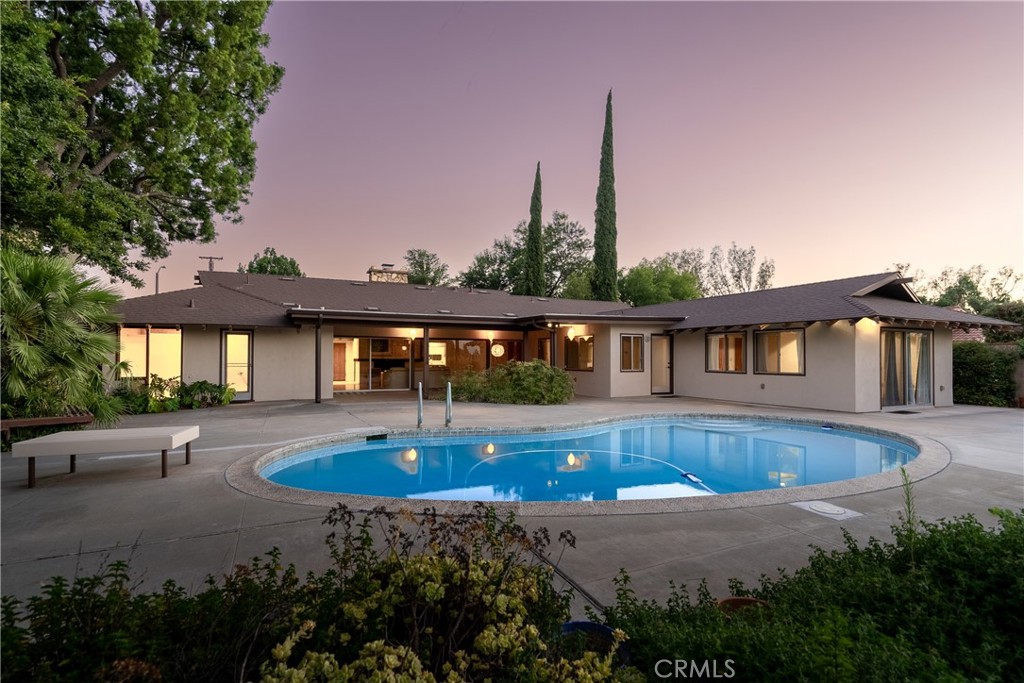 4907 Cliffside Drive Riverside, CA 92506 - Photo 27 of 29 a front view of a house with swimming pool
