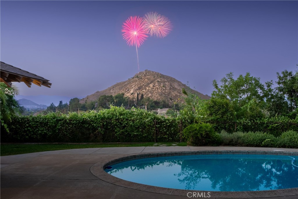 4907 Cliffside Drive Riverside, CA 92506 - Photo 28 of 29 a view of a swimming pool with an outdoor space