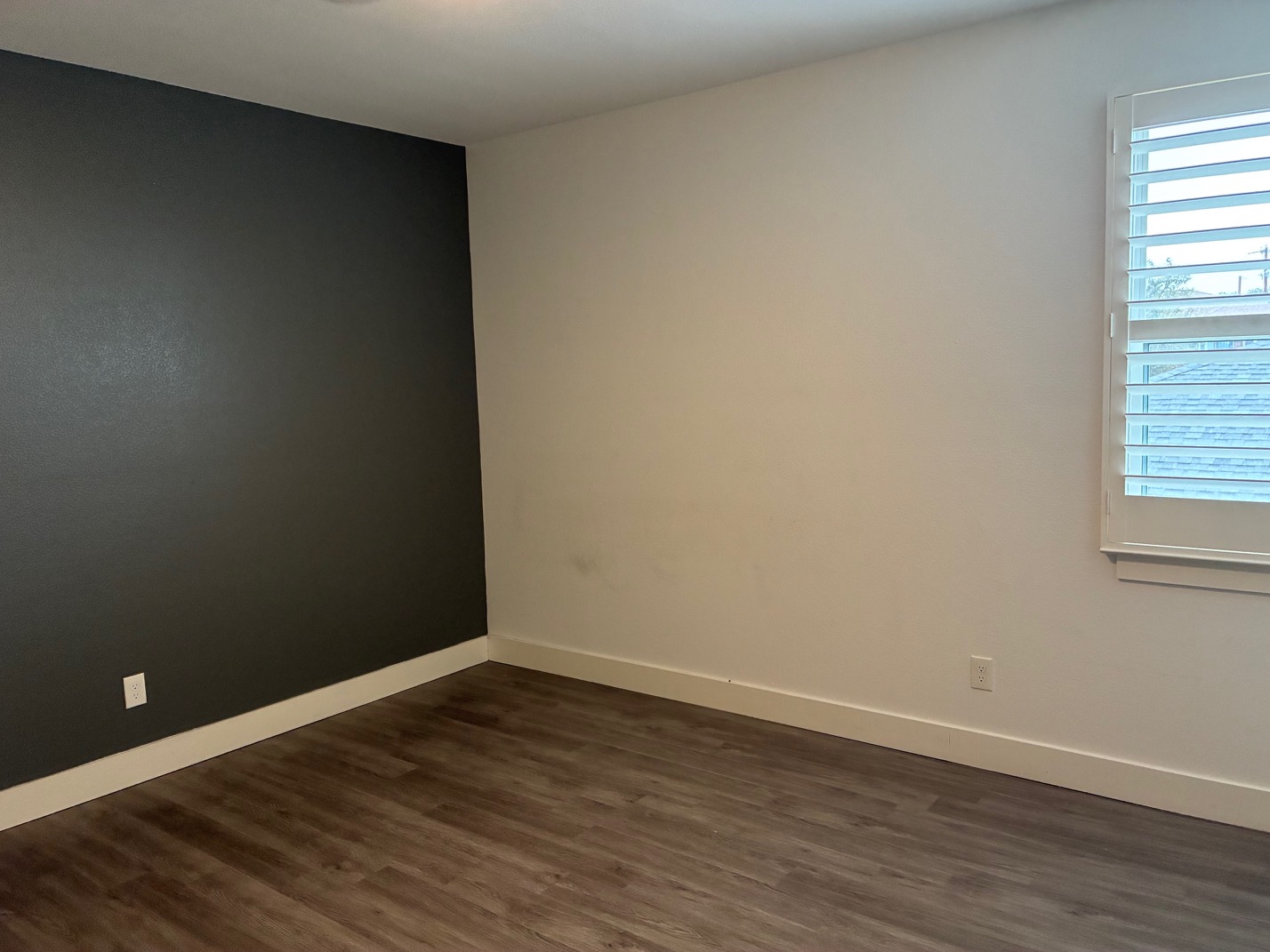 403 Summit Ridge Drive North Jonestown, TX 78645 - Photo 12 of 15 a view of an empty room with wooden floor and a window