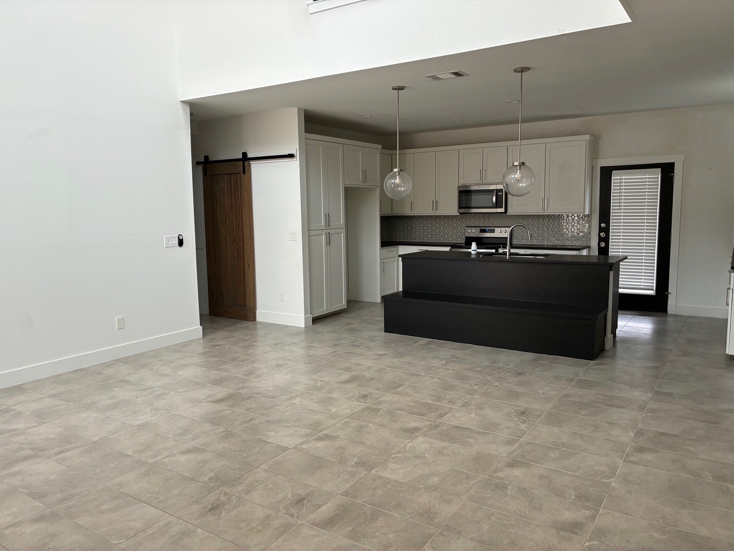 403 Summit Ridge Drive North Jonestown, TX 78645 - Photo 2 of 15 a living room with hard wood flooring