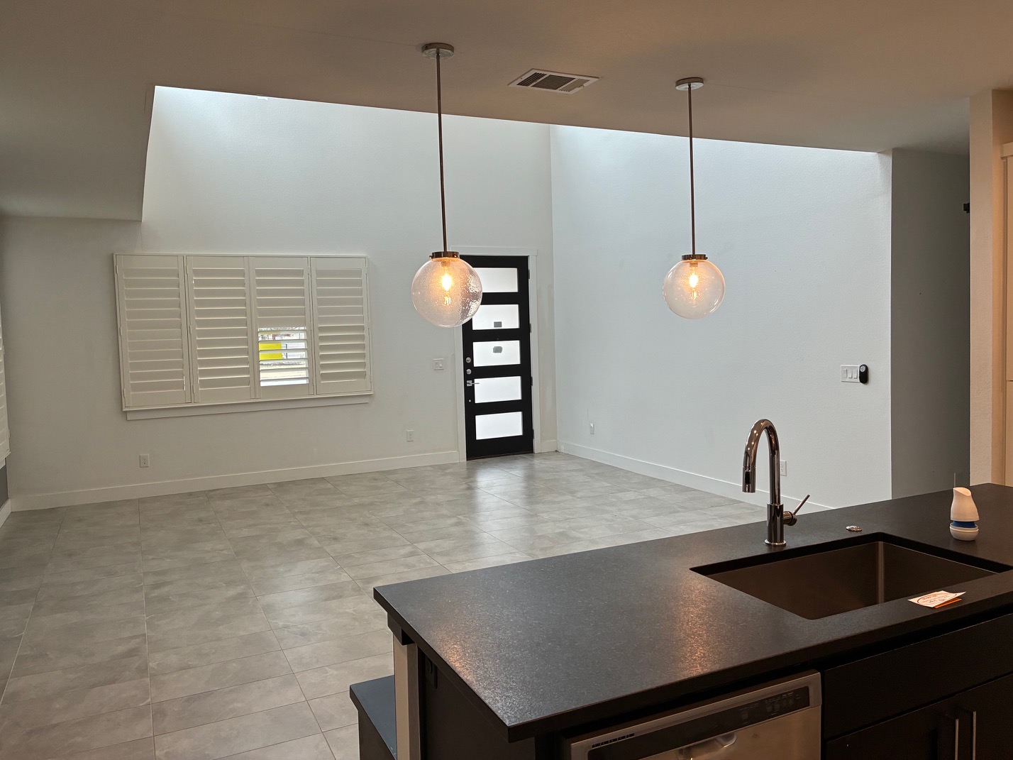 403 Summit Ridge Drive North Jonestown, TX 78645 - Photo 5 of 15 a kitchen with a sink a counter space and a window
