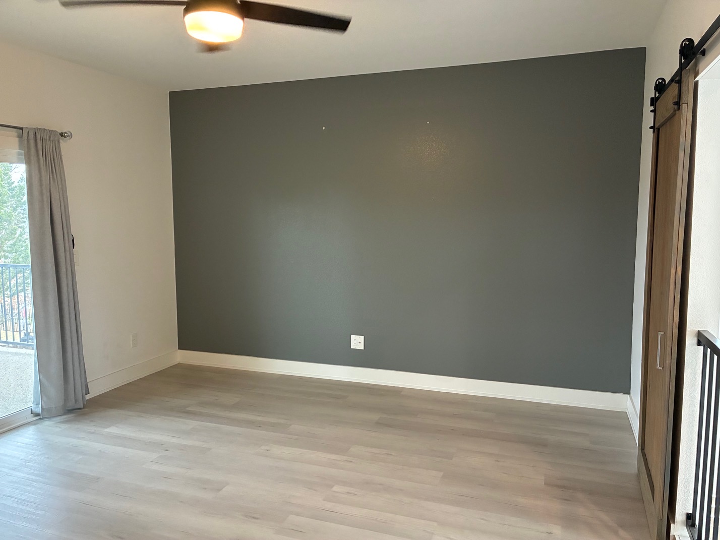 403 Summit Ridge Drive North Jonestown, TX 78645 - Photo 9 of 15 a view of an empty room with wooden floor