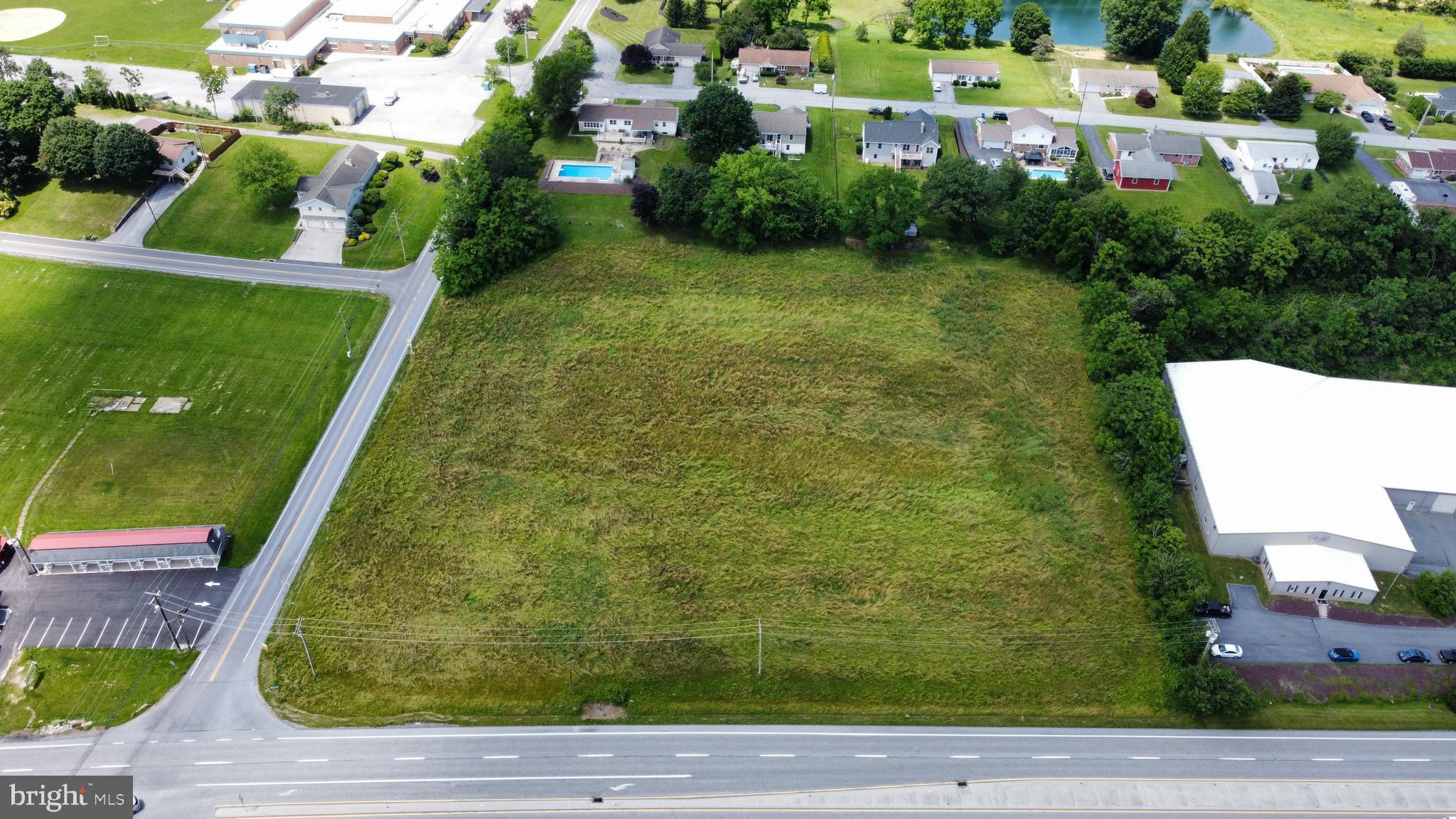 2570 Sand Beach Road Grantville, PA 17028 - Photo 13 of 19 a view of a yard with potted plants