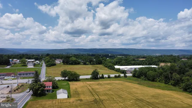 a view of a yard with an outdoor space