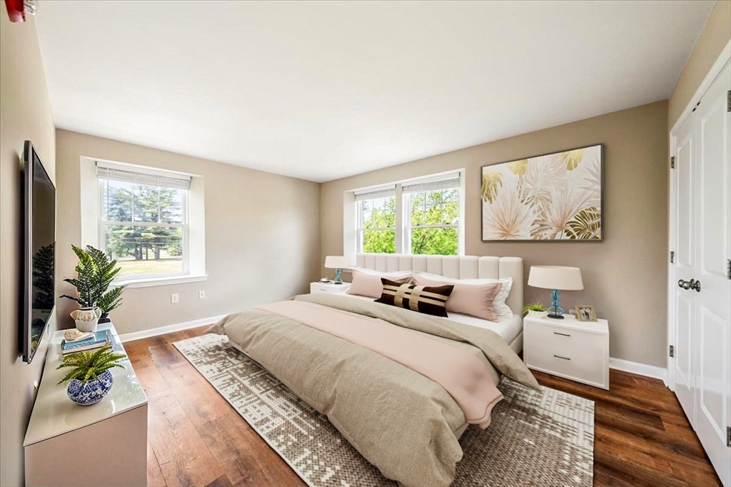 6 Bates Street, Unit A Devens, MA 01434 - Photo 23 of 41 a bedroom with a bed and a window