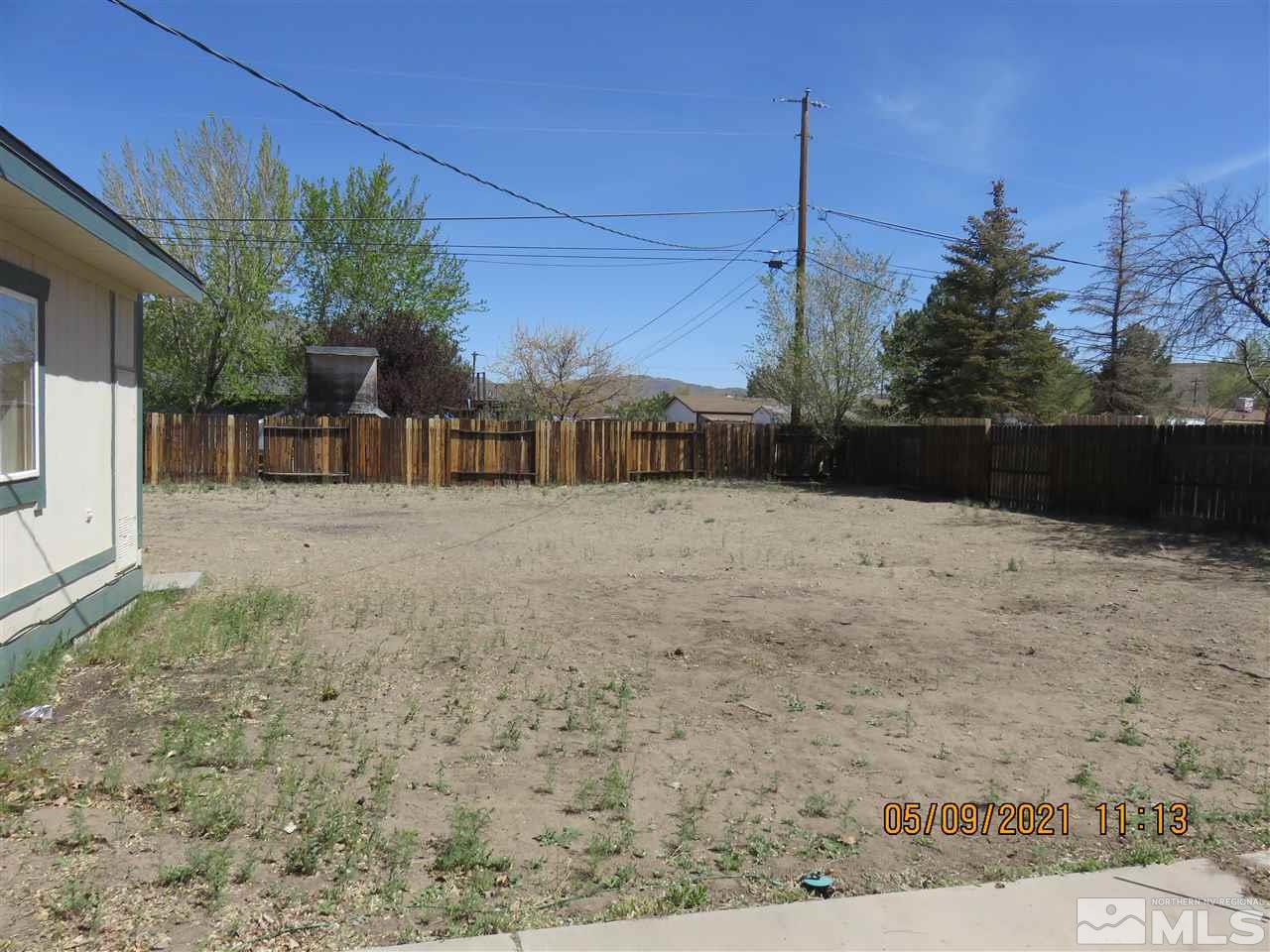 17525 Fantail Street Reno, NV 89508 - Photo 12 of 13 a view of house with a yard